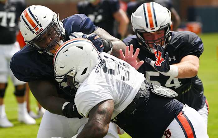 Keiondre Jones (58), Morris Joseph Jr. (91), Tate Johnson (54)Auburn football practice on Thursday, Aug. 11, 2022 in Auburn, Ala. Todd Van Emst/AU Athletics